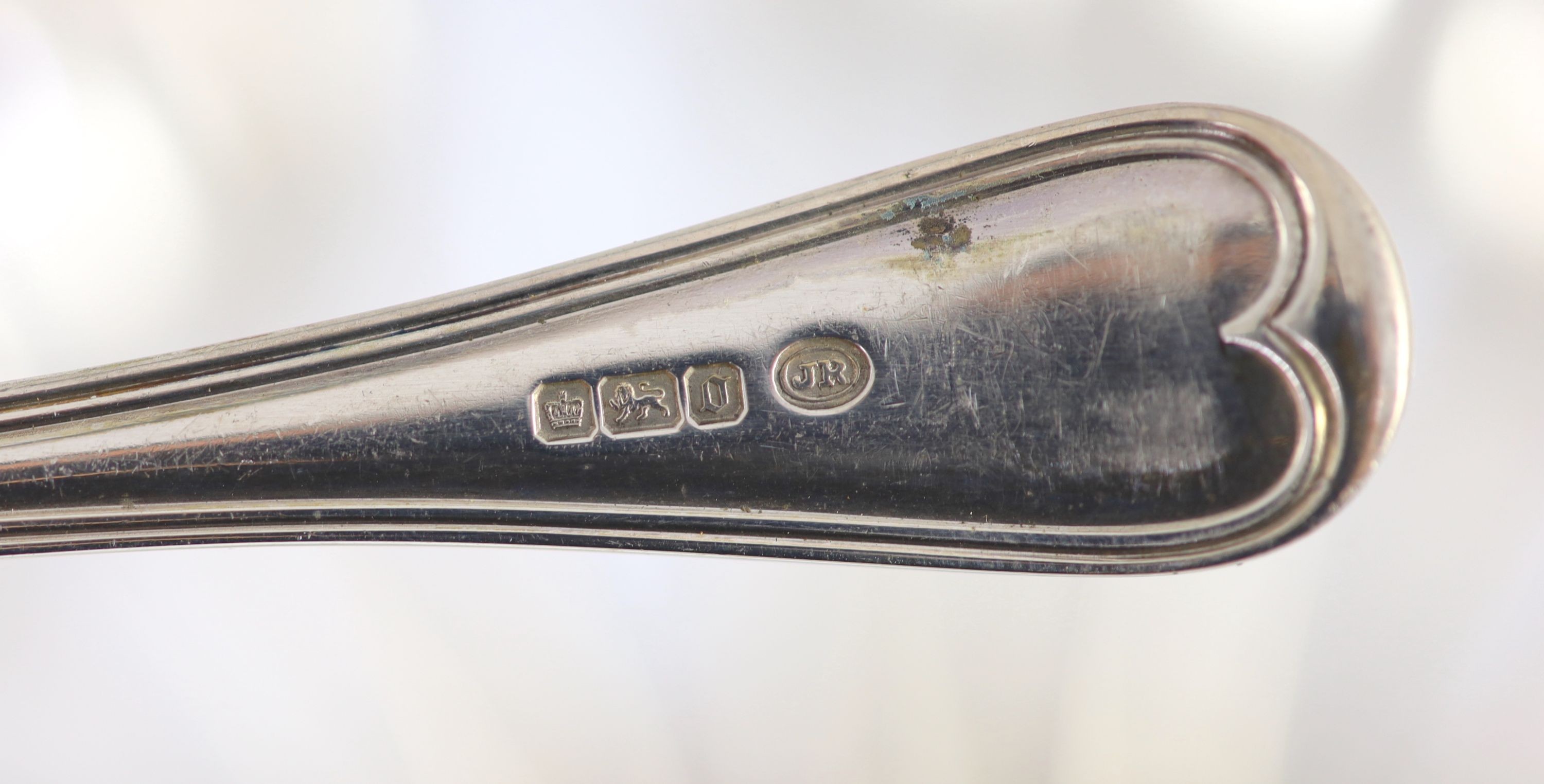 A part canteen of Edwardian silver Old English double struck thread pattern flatware for twelve by John Round & Son Ltd